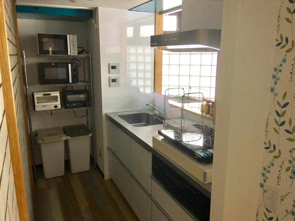 Guesthouse Origami Hiroshima Exterior foto
